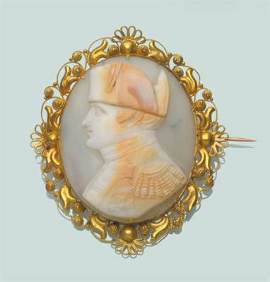 Lot 671 - A Cameo Brooch, the shell carved to depict Napoleon Bonaparte, within a scroll and filigree...