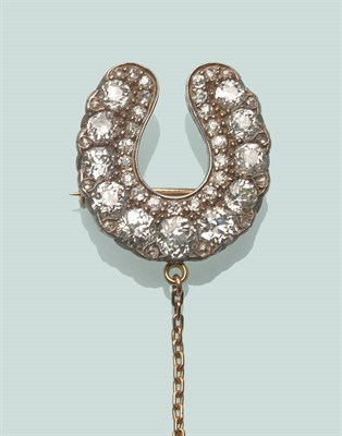 Lot 674 - A Late 19th Century Diamond Horseshoe Brooch, graduated old cut diamonds with an inner border...