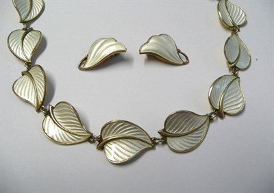 Lot 680 - A Norwegian Enamelled Necklace, of leaf forms, chain linked and enamelled in white, length...