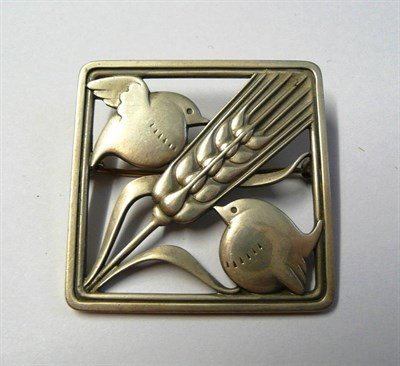 Lot 682 - A Silver Brooch, by Georg Jensen, the square frame with a wheatsheaf diagonally and a bird in...