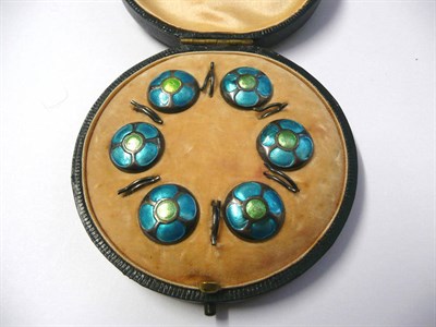 Lot 683 - A Cased Set of Enamelled Buttons, the set of six decorated with a flower, in green and blue,...