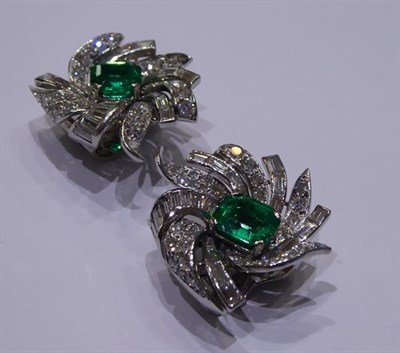 Lot 2115 - A Pair of Art Deco Emerald and Diamond Cluster Earrings, the emerald-cut emeralds within a...