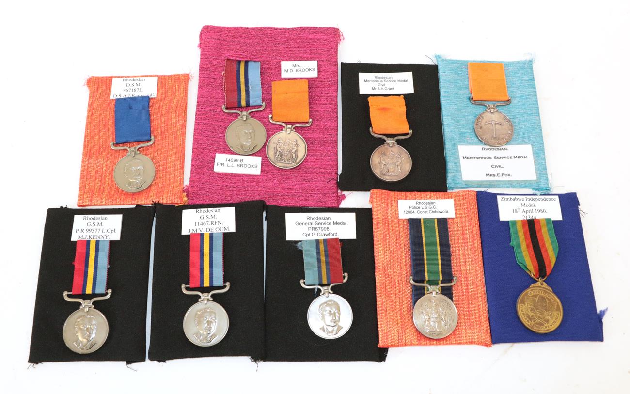 Lot 8 - A Collection of Nine Rhodesian Medals:- District Service Medal to 367137L D.S.A. J.KAMPAUNDI; a...