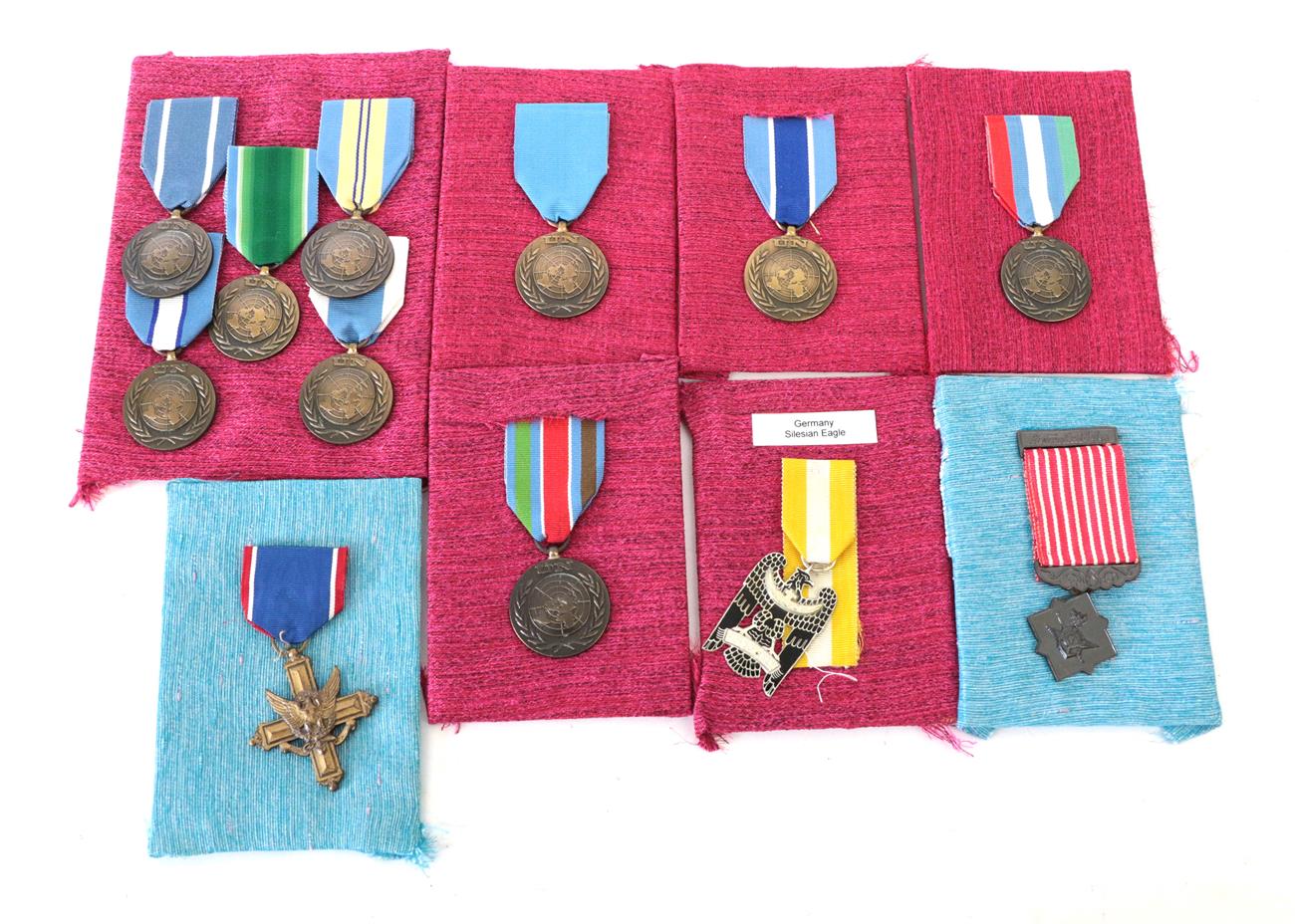 Lot 16 - A US Distinguished Service Cross, un-numbered, with ribbon; Thailand - a Freemen Safeguarding...