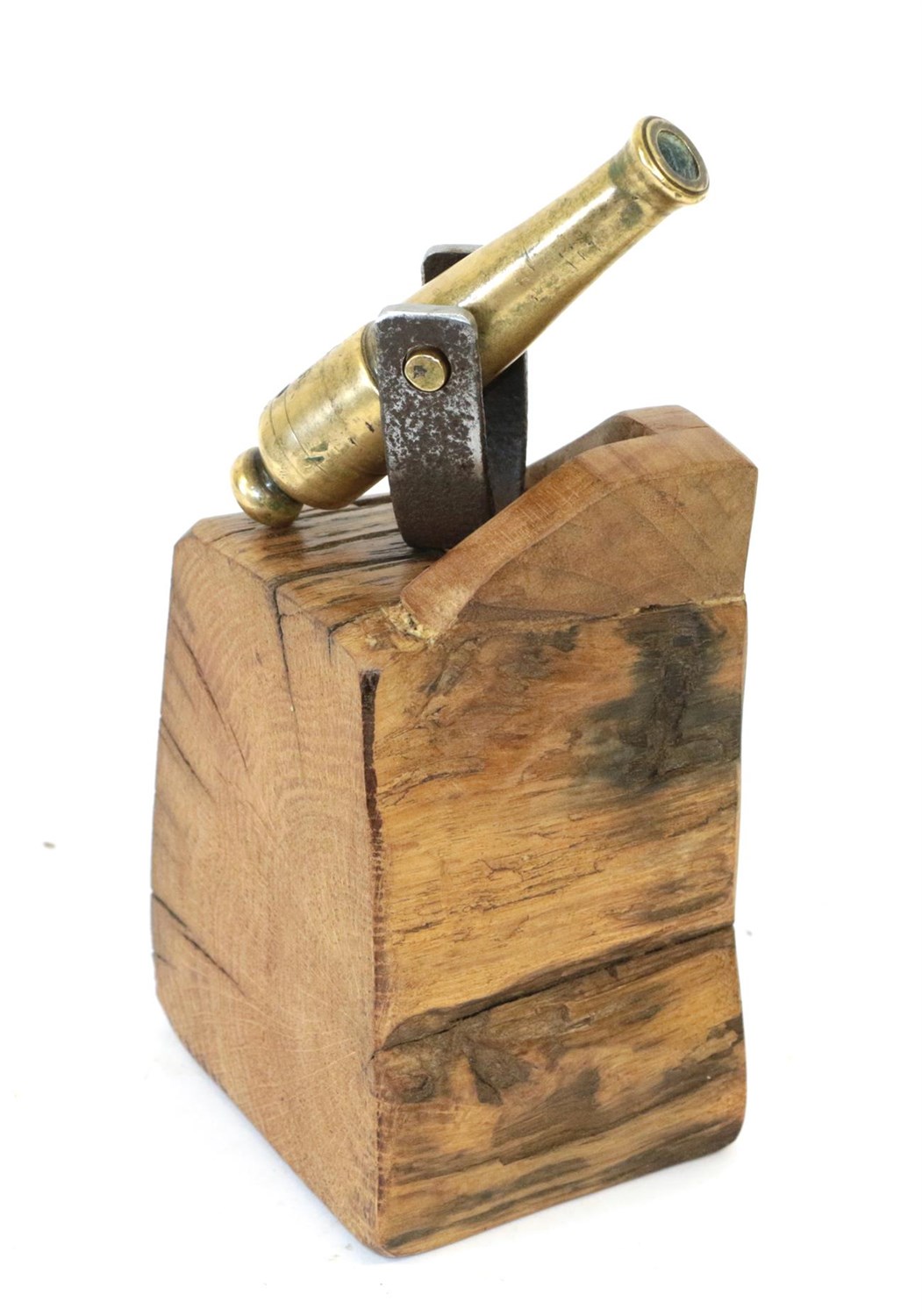 Lot 48 - A Small Brass Desk Cannon, the 11cm barrel stamped with broad arrow/V R and mounted on an oak...