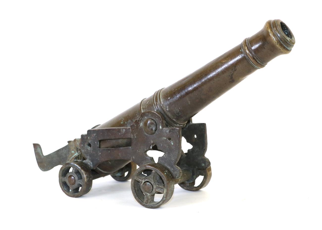 Lot 49 - An 18th/19th Century Bronze Signalling Cannon, the 32cm ringed barrel with ogee muzzle, capstan...