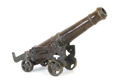 Lot 49A - An 18th/19th Century Bronze Signalling Cannon, the 32cm ringed barrel with ogee muzzle, capstan...