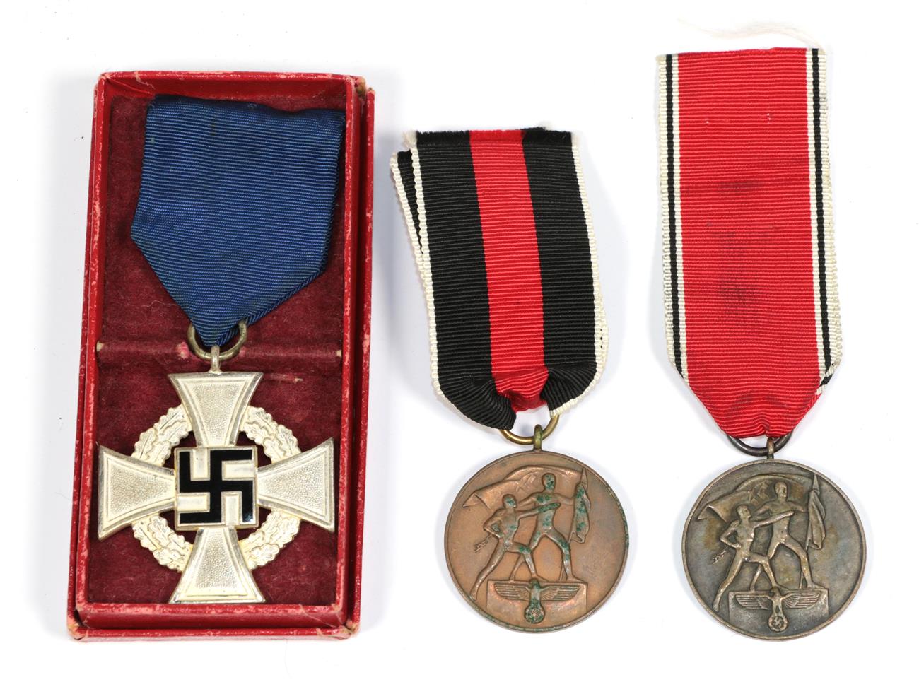 Lot 89 - Three German Third Reich Medals  25 Year Faithful Service Cross; Czechoslovakia Anschluss Medal...