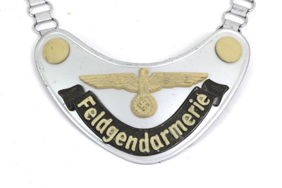 Lot 92 - A German Third Reich Feldgendarmerie Gorget, in magnetic silvered metal, the applied black...