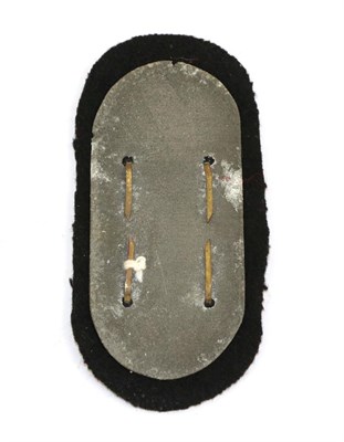 Lot 93 - A German Third Reich Narvik Shield, Gold Class, Kriegsmarine, with black wool backing, the...