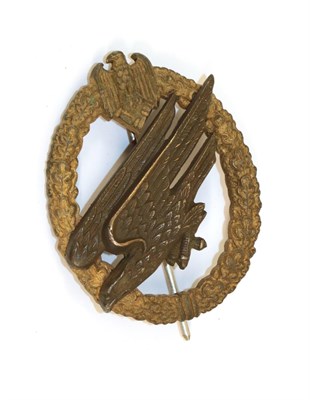 Lot 99 - A German Third Reich Army Paratrooper's Badge, the eagle with traces of silvering, the reverse with