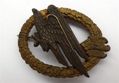 Lot 99 - A German Third Reich Army Paratrooper's Badge, the eagle with traces of silvering, the reverse with