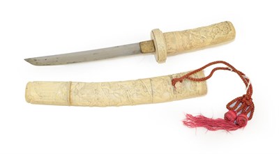 Lot 108 - A Late 19th Century Japanese Ivory Tanto, the 18cm blade with almost horizontal hamon and one piece