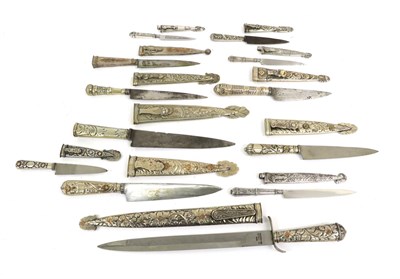 Lot 118 - A Collection of Twelve Argentinian Gaucho Knives, of varying sizes, each with white metal hilt...