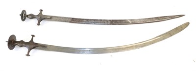 Lot 124 - An 18th Century  Indian Tulwar Sword, the 74cm single edge curved steel blade double edged for...