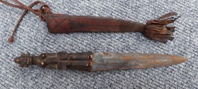 Lot 150 - A Masai Seme Knife, with 26cm double edge leaf shape blade, hide bound grip and scabbard; two...