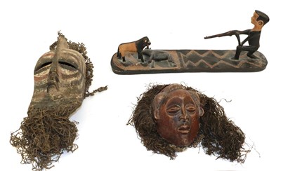 Lot 167 - A Songye Kifwebe Female Wood Mask, with shallow crest, triangular block nose and rectangular...