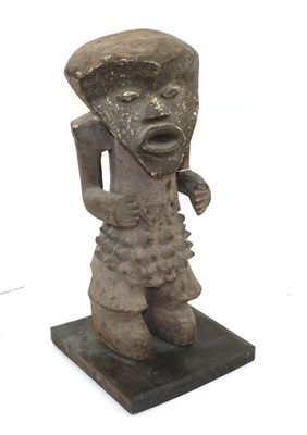 Lot 169 - A Mid-20th Century Mambila Guardian Figure, Cameroon, with large rounded triangular head, the heart