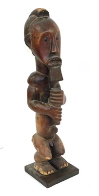Lot 170 - A 20th Century Southern Fang Male Reliquary Guardian Figure, Gabon, with block carved coiffure,...