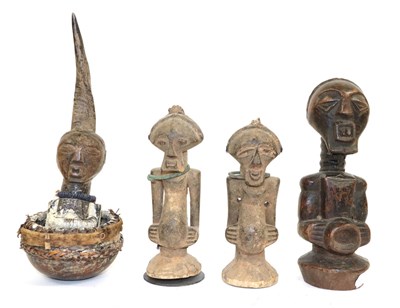 Lot 174 - A Songye Fetish Figure, DRC, the head set with a bushbuck horn, wearing a bead necklace, the...