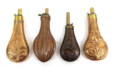 Lot 205 - Two Copper Powder Flasks, one embossed with a stylised shell, the other with frilled leaves,...