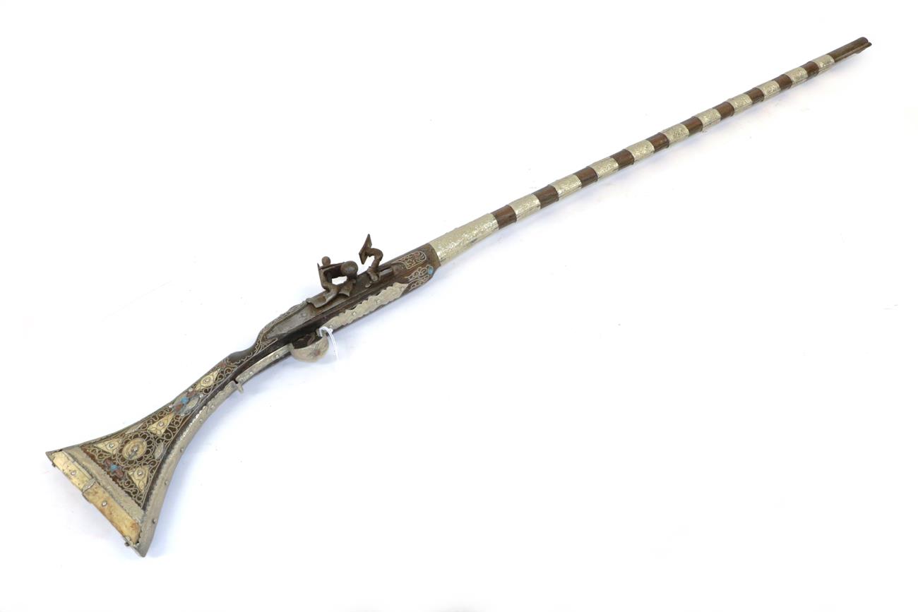 Lot 239 - A 19th Century Algerian Snaphaunce Musket, with 100cm round steel barrel, wht wood full stock...