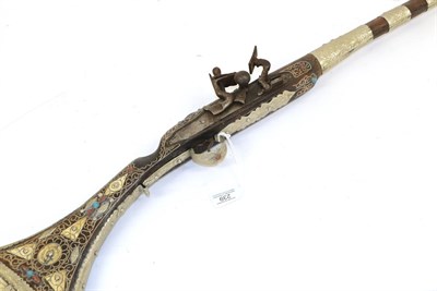 Lot 239 - A 19th Century Algerian Snaphaunce Musket, with 100cm round steel barrel, wht wood full stock...