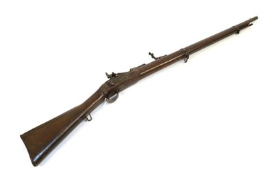 Lot 243 - A 19th Century Continental Trapdoor Rifle, the 77cm round barrel with hinged ladder rear sight, the