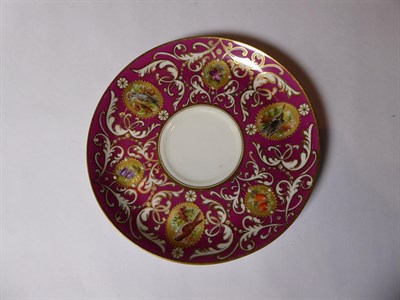 Lot 1 - Royal Worcester tea wares decorated with vignettes of birds on a gilt highlighted pink ground...