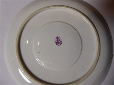 Lot 1 - Royal Worcester tea wares decorated with vignettes of birds on a gilt highlighted pink ground...
