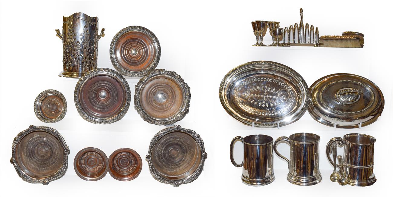 Lot 7 - Assorted silver plate including various bottle coasters, entree dish, pint tankards, flatware...