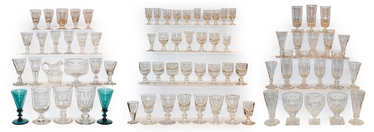 Lot 23 - A quantity of Georgian and later drinking glasses, most with knopped stems, some with etched...