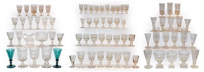 Lot 23 - A quantity of Georgian and later drinking glasses, most with knopped stems, some with etched...