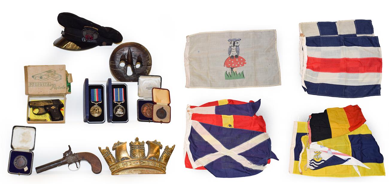 Lot 35 - A merchant naval cap and gilt brass plaque, various signalling flags, rigging block, a 19th century