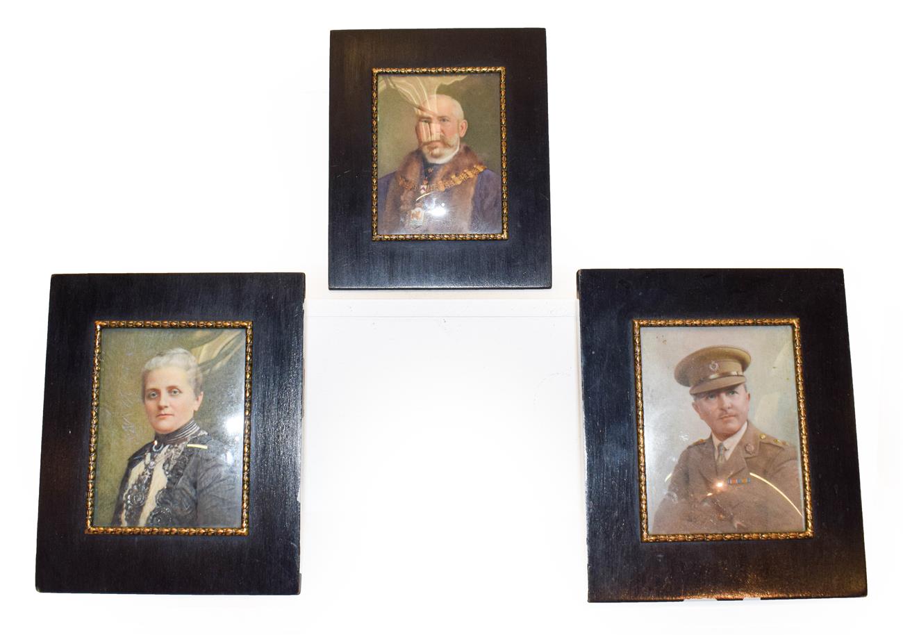 Lot 43 - Three early 20th century ivory portrait miniatures in ebonised easel frames, depicting John...