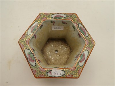 Lot 53 - A 19th century Chinese yellow ground porcelain vase (cut down), painted with lotus scrolls,...