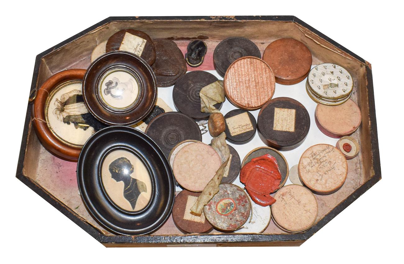 Lot 54 - A collection of 19th century wax seals, cameo and intaglio impressions, mostly boxed and...