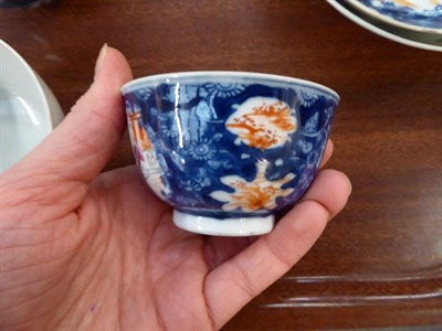 Lot 61 - A Chinese blue and white tea bowl painted with fish, Kangxi mark, an 18th century Chinese tea...