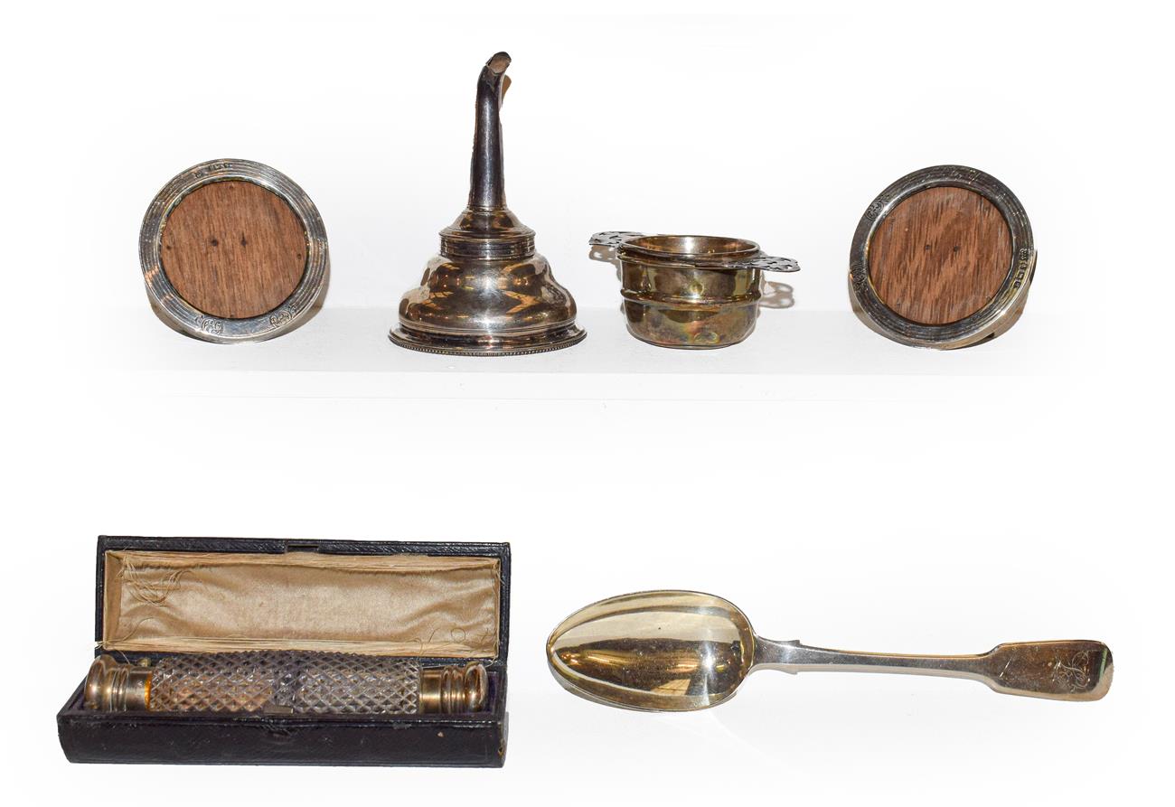 Lot 77 - A tray of silver items including a silver wine funnel possibly by William Schofield, London 1822, a