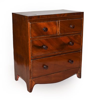 Lot 86 - A 19th century miniature apprentice made mahogany chest of drawers, straight fronted, two short...