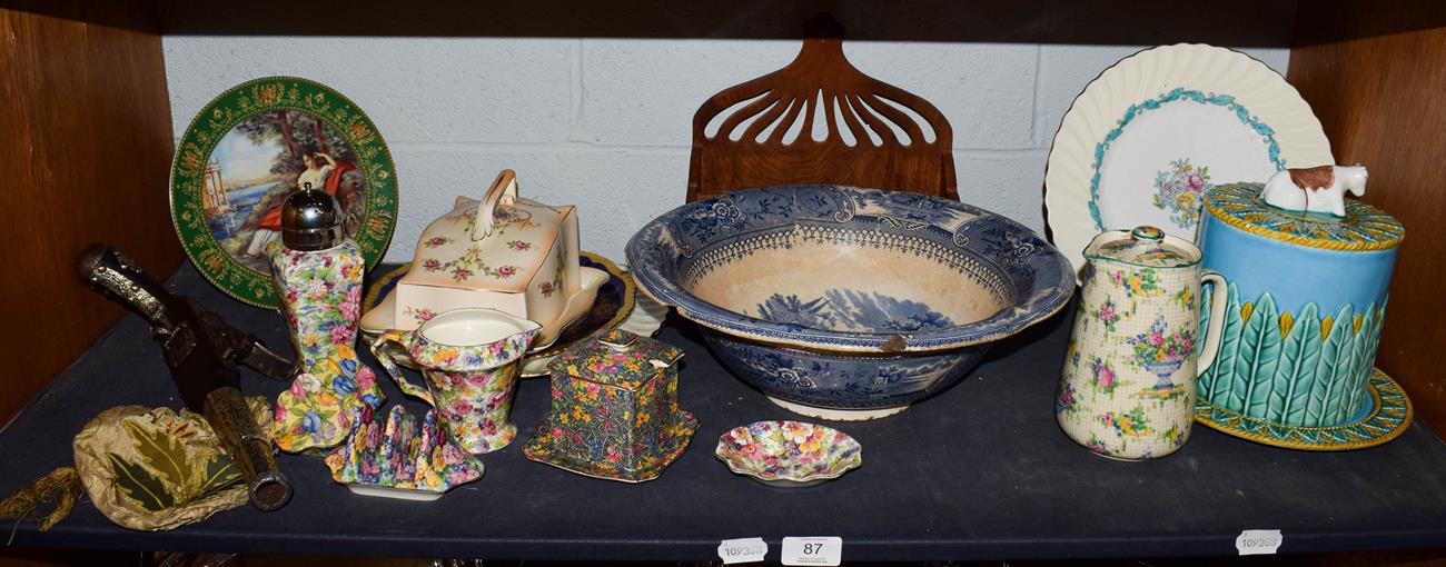 Lot 87 - A group of ceramics including a majolica cheese dome and base, various chintz tea wares, blue...