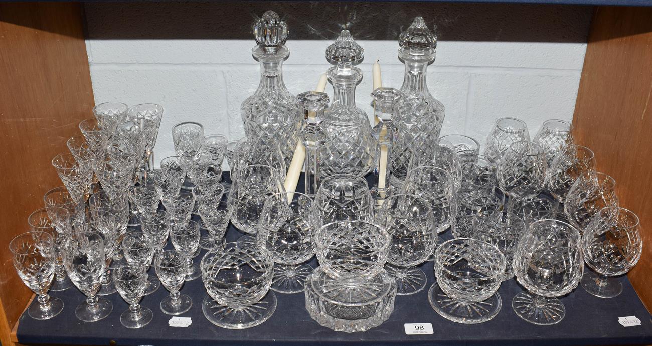 Lot 98 - A mixed suite of crystal drinking glasses etc, to include three decanters, Waterford brandy...