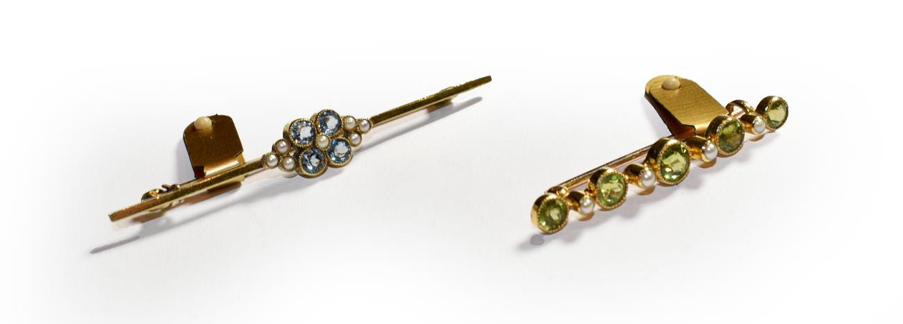 Lot 121 - An aquamarine and split pearl bar brooch, length 5.8cm and a peridot and split pearl bar...