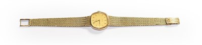 Lot 133 - A lady's 9 carat gold wristwatch, signed Omega, De Ville, circa 1975, mechanical lever...