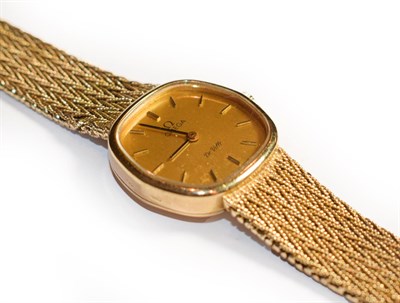 Lot 133 - A lady's 9 carat gold wristwatch, signed Omega, De Ville, circa 1975, mechanical lever...
