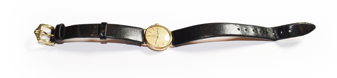 Lot 134 - A lady's 9 carat gold wristwatch, signed Omega, circa 1975, mechanical lever movement, 19mm wide