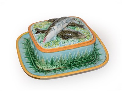 Lot 154 - A 19th century George Jones Majolica sardine dish and cover and stand, 21cm by 19cm