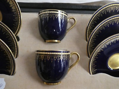 Lot 159 - A cased Royal Worcester cobalt blue and gilt highlighted coffee set comprising six cups and saucers