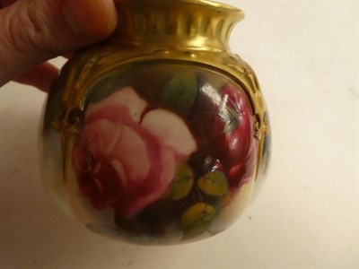 Lot 160 - A Royal Worcester pot purri vase and cover painted with roses, puce mark 12cm high 1923