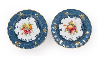 Lot 161 - A pair of Royal Worcester dishes with a crimped edge, blue and gilt decoration with fruit 1925...